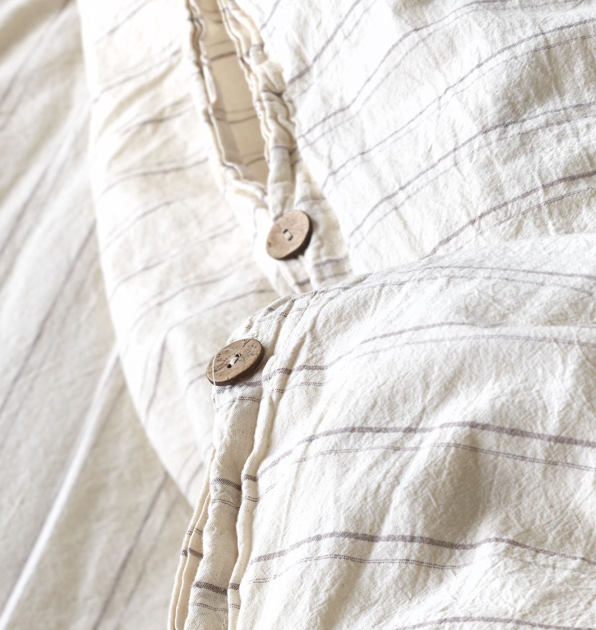 Coconut buttons on a striped washed cotton duvet cover